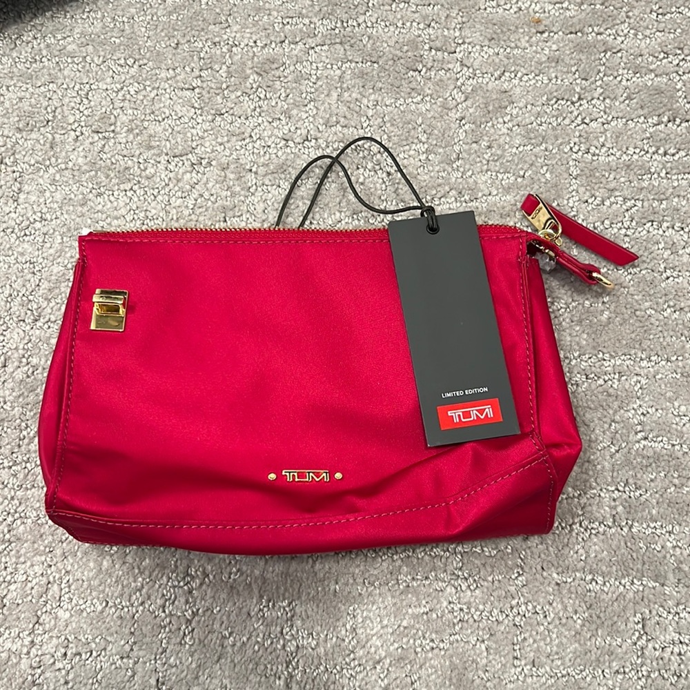 Tumi limited edition red clutch bag